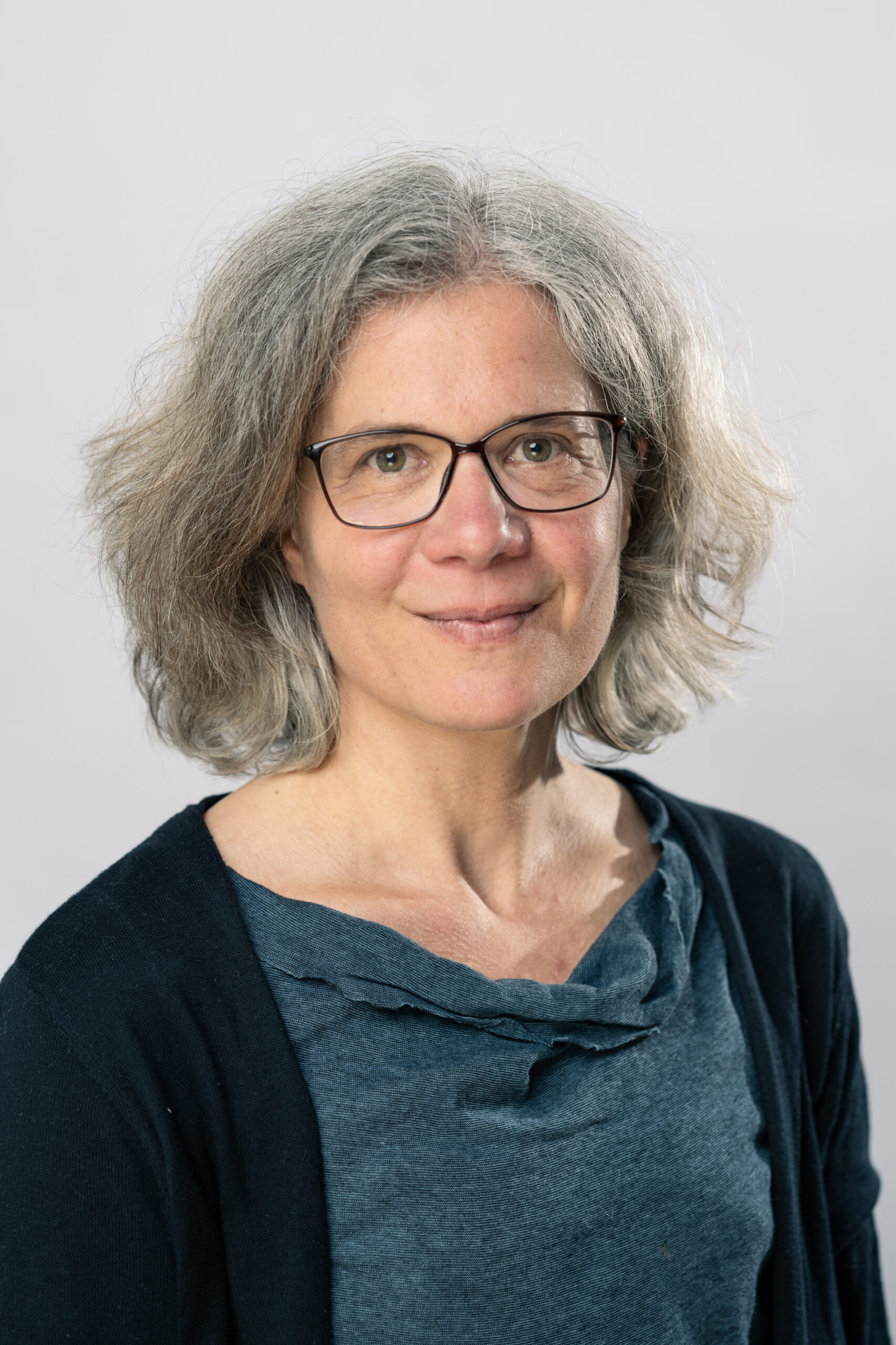 Portrait Marion Rolle Frau mit Brille